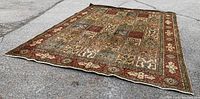 Entire rug laid flat on pavement, angled view