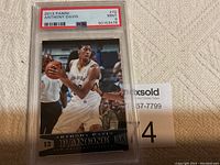 Front view of the graded 2013 Panini Anthony Davis basketball card in a hard plastic case with PSA label showing grade Mint 9.