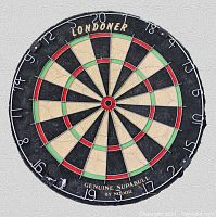 Front side of the Londoner Genuine SUPABULL dart board showing detailed segments, brandings, and numbering