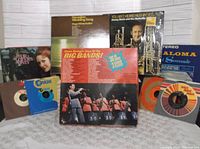 Photo showing multiple vinyl records including Big Bands compilation and albums from Helen Reddy, Donny and Marie Osmond