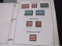 Page from Heritage Collection album showing 1946-47 airmail stamps featuring Skymaster, Statue of Liberty, and other themes.