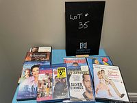 Photo showing seven DVD and Blu-ray cases displayed on a table including Failure to Launch and The Nanny Diaries.