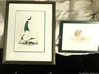 Both framed artist prints seen together, one by Benjamin Chee Chee and one signed by Carol Myers.