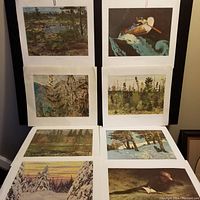 Eight Canadian landscape paper prints arranged in two columns. Scenes include forests, water, snow, and canoeing.
