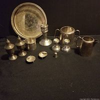 Overview of all items arranged on dark background