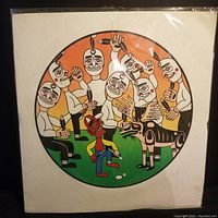 Front view of framed signed print featuring multiple stylized figures and an animal in a circular colored background.