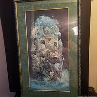 Full framed print showing the detailed fantasy castle and characters, with a black frame and green matting.