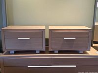 Front view showing both nightstands placed on dresser