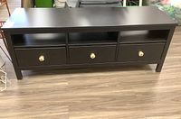 Front view of entire bench showing three drawers and cubby shelves