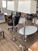 Pair of lamps full view showing bases, columns, accents, and shades