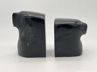 Side-by-side view of both bookends showing relative height and shape