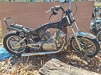 Side view of 1981 Yamaha XV750H Virago motorcycle frame with engine and front wheel removed, showing V-twin engine, frame, handlebars, and some components.