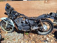 Side view of 1982 Yamaha XJ650RJ SECA motorcycle salvage lot showing frame, engine, and rear wheel assembly.