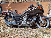 Full side view of the Yamaha Venture Royale motorcycle showing the entire bike, seat, tires, exhaust and side profile.