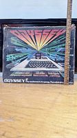 Original Odyssey2 outer box with graphic artwork and ruler showing dimensions