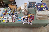 Wide view of entire lot showing sealed packs, loose cards, calendars and boxes