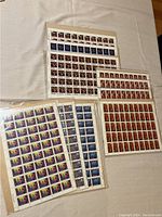 Overview image showing multiple sheets of Canadian Christmas stamps, arranged in two groups of panes with varied colors and designs.