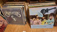 Carpenters self-titled LP and The Monkees Best of compilation side by side
