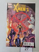 Front cover of The All New X-Men #1 comic book with Marvel branding and X-Men characters.