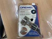 Photo of unopened Dremel Mini Saw Attachment #670 in original packaging showing item and details including blade diameter and number of teeth.