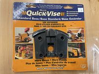 Photo of Quick Vise Standard Base packaged on branded cardboard backing.