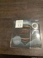 Packaged Batman v Superman 2016 25 cents coin set with themed artwork on packaging.
