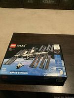 Box of Lego Ideas International Space Station model 21321 showing full kit with image of model and branding