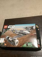 Box front showing LEGO Star Wars The Mandalorian N-1 Starfighter set 75325 with 417 pieces for ages 9+. Box features image of the assembled starfighter flying over a desert landscape.