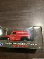 Front view of the collectible 1948 Ford sedan delivery van model in original box showing Canadian Tire logo and text.