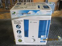 Box of Pure Guardian Easy Top Fill Ultrasonic Humidifier showing front and capacity details