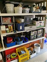 Full shelving unit showing multiple gardening and tool items arranged on numbered shelves