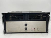 Front view of amplifier showing dual channel LED meters and front panel controls