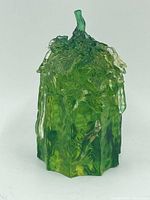 Front and side views of a green translucent hexagonal glass sculpture featuring raised intricate flower, leaf, and vine details with a twisted stem detail at the top.