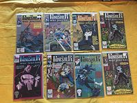 Eight issues of The Punisher War Journal comics arranged in two rows, each comic individually bagged and boarded, showing different cover art featuring The Punisher character.
