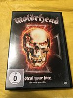 Front cover of the Motörhead live DVD titled 'Steal Your Face: The Early Years Live' showing a flaming skull graphic and logo.