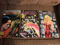 Photo showing three Wanderers comic books featuring colorful characters and excellent condition.