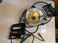 Top view of the Craftsman circular saw showing blade, handle and cord.