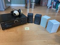 Overall view of the receiver, speakers and headphones, showing quantity and condition.