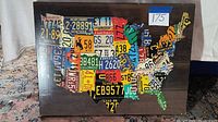 Full front view of the USA map wall art showing detailed license plate segments for each state,