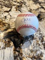 Front view showing John Olerud autograph on white baseball with red stitching.