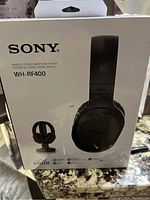 Sony WH-RF400 wireless stereo headphone system in original box, showing front of box with product image and wireless logos.
