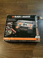 Box of Black & Decker Portable Power Station with specifications and images on packaging.
