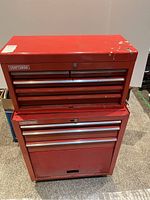 Front view of assembled two-piece red Craftsman tool chest