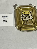 Ashtray front side showing Labatt's Crystal Lager Beer logo with John K. Labatt image.