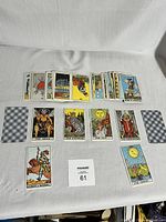 Full view of the tarot cards spread showing multiple individual cards with colored illustrations and backs