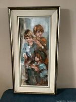 Full front view of the framed painting showing three children
