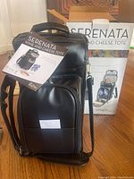 Black Serenata Wine and Cheese Tote bag in new condition with box and pamphlet.