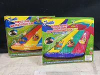 Two boxed Jambo Triple Lane Water Splash Slides showing the product design, packaging, and branding.