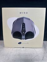 Front view of the Miko YH Foot Massager box showing the product image and brand name