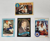 Four Eric Lindros hockey trading cards displayed front side, showing color image and design from early 1990s.